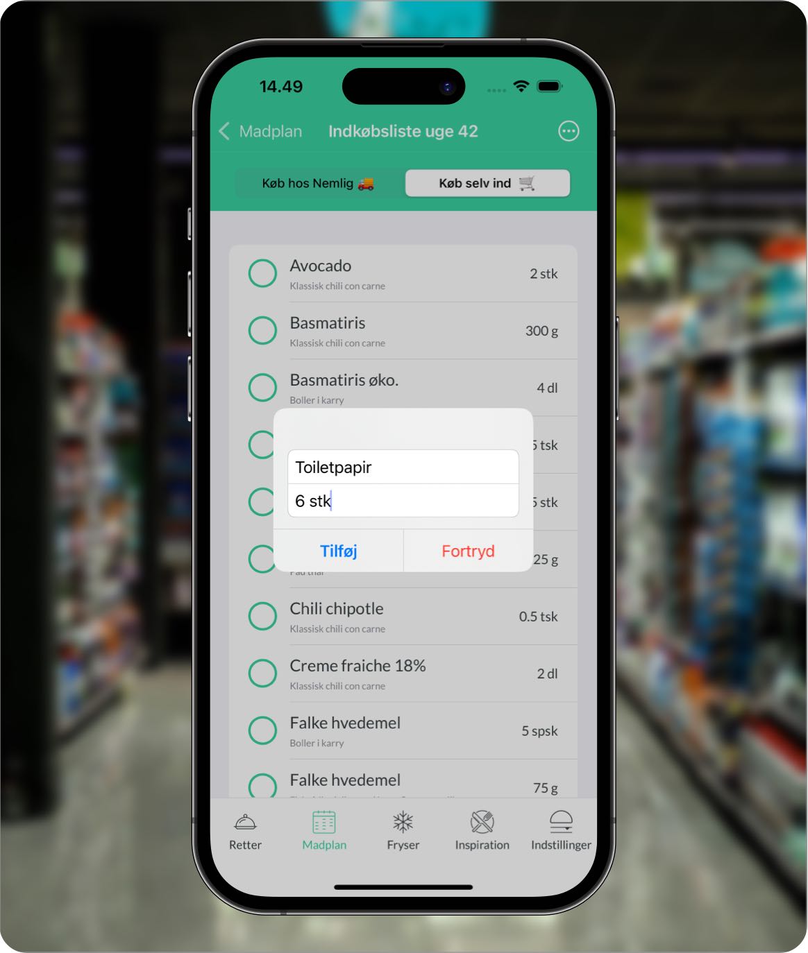 Visning af pop-up i Nem Madplan appen, hvor man kan tilføje egne varer som toiletpapir til indkøbslisten, hvilket gør indkøbslisten endnu mere fleksibel og komplet.